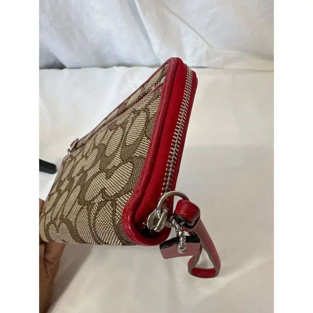 Coach Signature Canvas wristlet Wallet with Red Trim